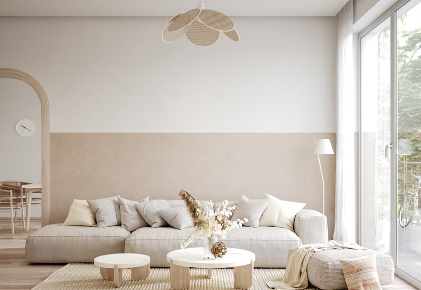 Room with fan ceiling lamp, ottoman, floor lamp, sliding door and window